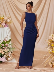 Detail of elegant navy sleeveless maxi dress showing side ruched waist and slit design