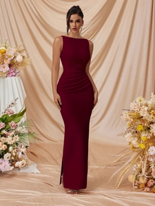 Detail of elegant burgundy sleeveless dress showing refined side ruching and fabric texture