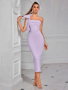 Detail of the oversized bow on the shoulder of this elegant lilac evening gown