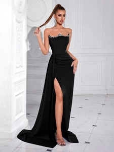 Elegant strapless black evening dress with crystal trim and high side slit detail