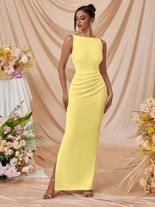 Sleeveless lemon yellow slim fit maxi dress with side slit and elegant ruching details