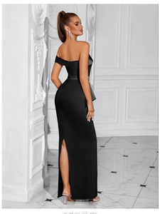 Detail of elegant black off-shoulder evening gown featuring a high back slit design