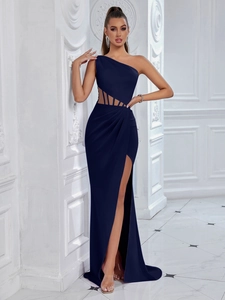 Detail of elegant navy blue evening dress showing one-shoulder and waist hollow mesh design