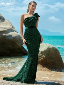 Elegant emerald green sequin one-shoulder fishtail evening gown with floor-length hemline