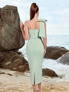 Elegant mint green one-shoulder bow evening dress with slim fit and back slit detail