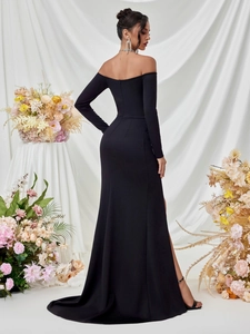 Elegant off-shoulder evening gown with a long sleeve design and floor-length fishtail hem