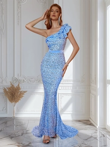 Detail of light blue sequined evening gown featuring asymmetric ruffle shoulder and waist belt