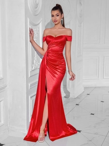 Detail view of red off-shoulder satin evening dress featuring a high slit and ruched waist
