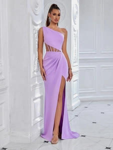 Detail of lavender one-shoulder evening gown featuring waist cutouts and high slit