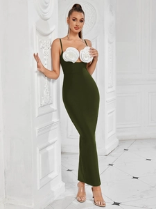 Detail of white 3D floral accents on a dark green bodycon evening gown dress