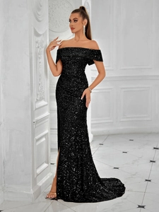 Close-up of off-the-shoulder neckline and shimmering sequins on a black evening gown