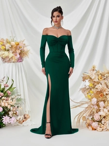 Elegant off-shoulder long sleeve maxi evening gown with high slit in dark emerald green