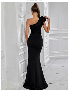 Elegant black one-shoulder fishtail evening dress with ruffled details and slim fit