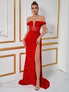 Close-up of red sequined off-shoulder gown with V-neck mesh detail and high side slit