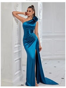 Detail of the oversized 3D flower decoration on the one-shoulder satin evening dress
