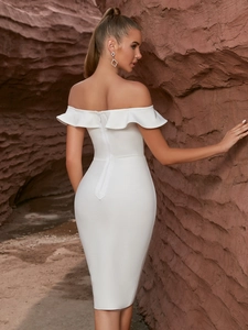 Elegant white off-shoulder bandage dress with ruffles shown from the back against nature
