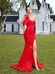 Elegant red sequin evening gown with one-shoulder bow, corset bodice and high leg slit