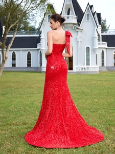 Elegant red sequin one-shoulder evening gown with bow detail and mermaid slit dress design