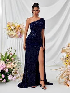 Elegant deep blue sequin one-shoulder evening gown with high slit and cape detail