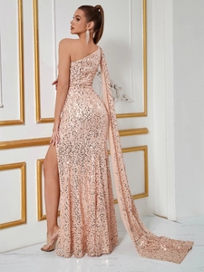 Elegant rose gold one-shoulder sequin evening gown with side slit and long cape trail