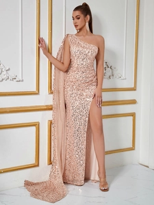 Elegant rose gold one-shoulder sequin evening gown with side slit and cape sleeve