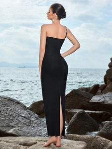 Elegant black one-shoulder evening dress with rhinestone details and high slit