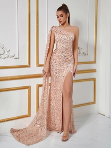 Detail of rose gold sequin evening gown with one-shoulder cape and high side slit