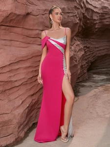 Elegant rose red evening dress with silver sequins, side slit, and asymmetric straps