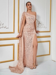 Elegant rose gold one-shoulder sequin evening gown with side slit and cape sleeve detail