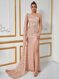 Elegant champagne sequin one-shoulder evening gown with long cape sleeve and high slit
