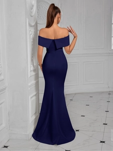 Back view of a navy blue off-shoulder mermaid evening gown with elegant collar detail