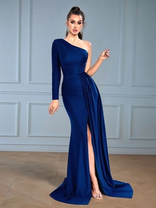Detail of elegant navy blue one-shoulder maxi dress with waist ruching and side high slit