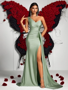 Detail of sage green satin one shoulder gown with elegant side slit and draping