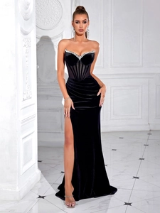 Elegant black velvet strapless evening gown with diamond neckline and high slit design