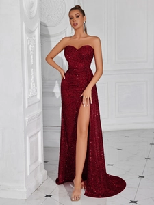 Elegant burgundy sequin strapless evening gown with a high slit and floor-length design