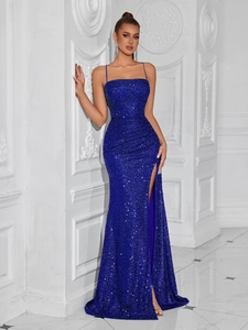 Elegant royal blue sequin evening gown featuring spaghetti straps and high side slit