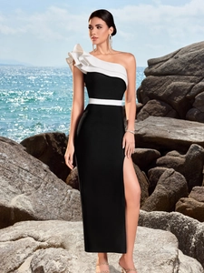 Elegant one-shoulder black and white color-block evening dress with side slit and ruffles