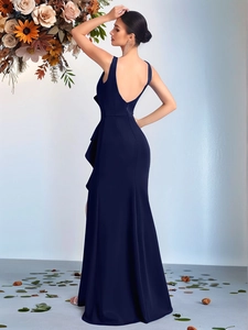 Elegant navy blue backless evening gown with side ruffle details and slim mermaid silhouette
