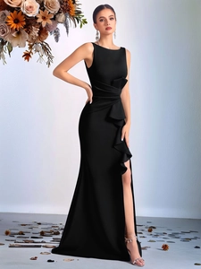 Elegant sleeveless black evening maxi dress with waist pleats and side ruffle slit design
