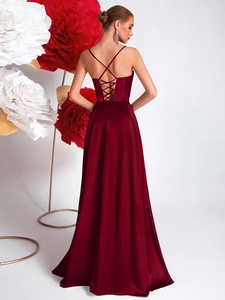 Elegant wine red satin evening gown with open back and lace-up detail for formal parties