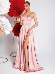 Pink satin corset maxi dress with high slit and thin straps for elegant party wear