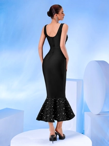 Elegant black bandage fishtail dress featuring white pearl beads and open back design