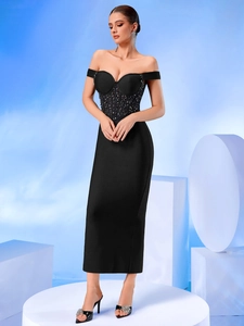 Detailed corset-style bodice with intricate black sequins and embroidery on off-shoulder dress