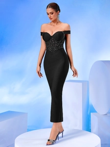 Detail of off-shoulder black bandage dress with sequins and corset structure