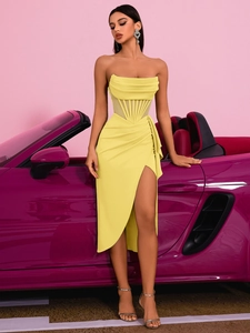 Detailed corset style bodice on yellow off-shoulder high-slit dress with boning structure