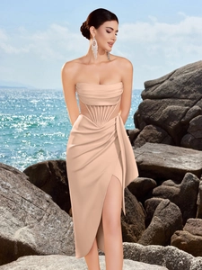 Detail of elegant off-shoulder corset dress with waist boning and side leg slit