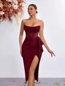 Detail of burgundy off-shoulder corset dress with waist boning and side high slit