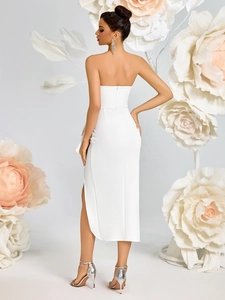 Elegant white off-shoulder dress featuring side slit detail and hidden back zipper