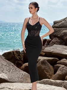 Sexy black mermaid evening dress with lace patchwork and deep V-neck by the sea