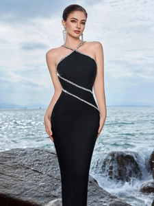 Elegant black halter evening gown with rhinestone accents and slim fit mermaid silhouette